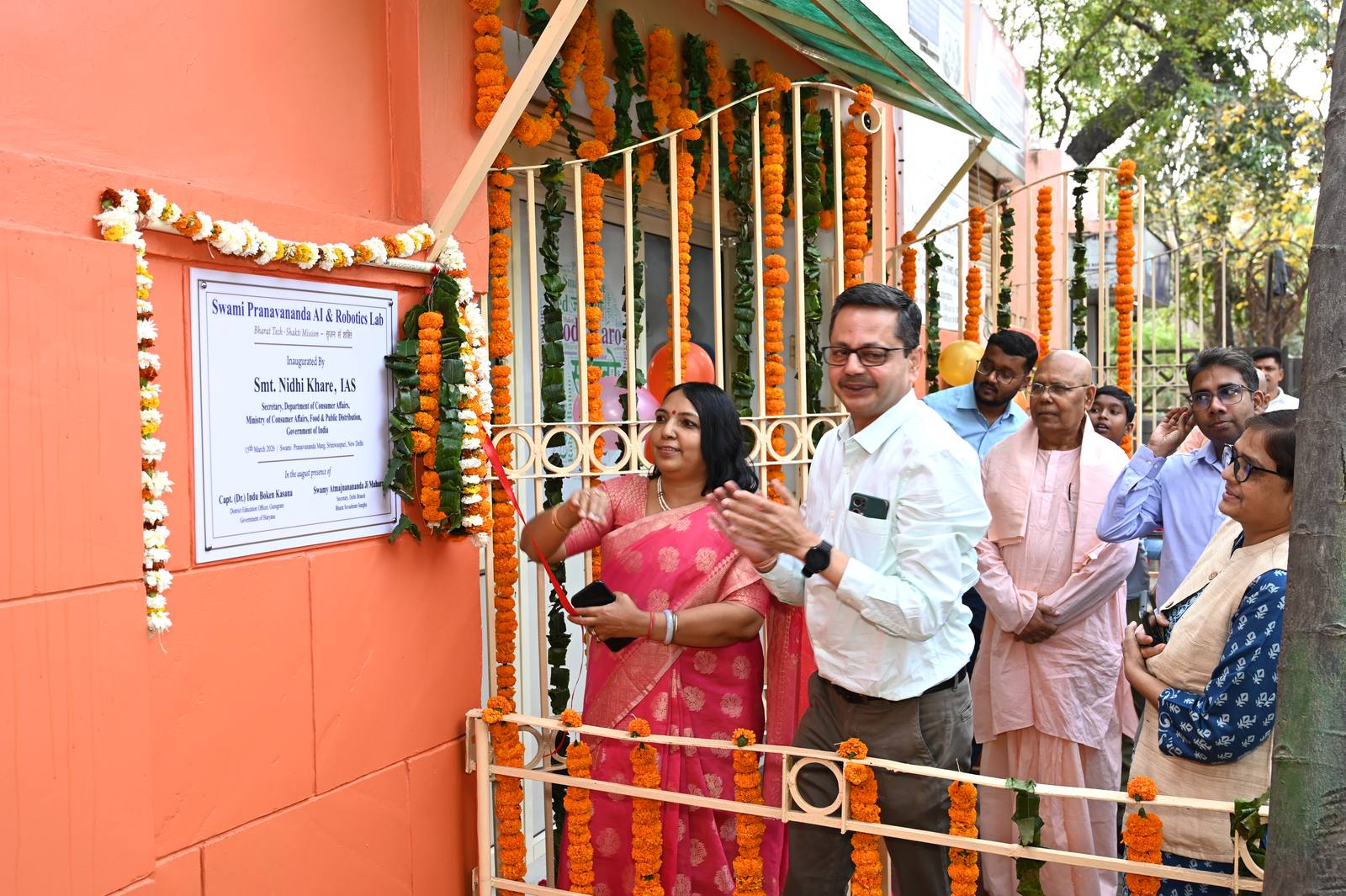 The inauguration plaque beside the lab entrance, naming Smt. Nidhi Khare IAS and the guests of honour.